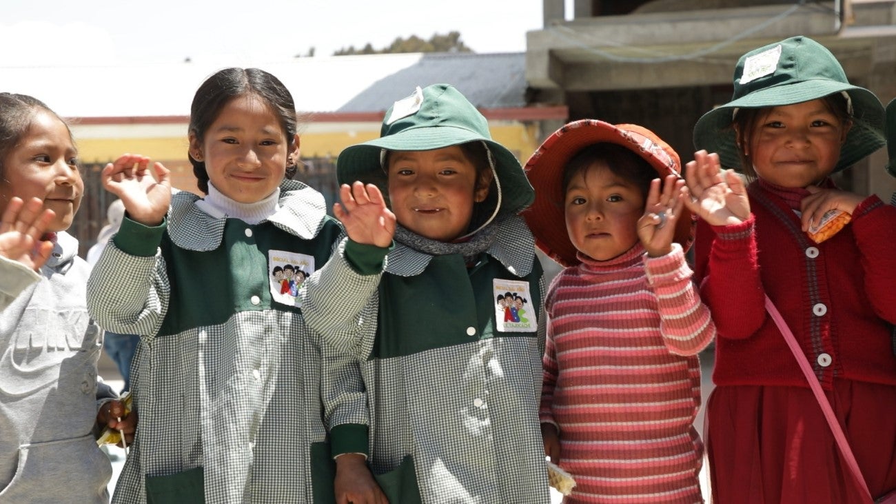 Children of the Americas looking at the camara