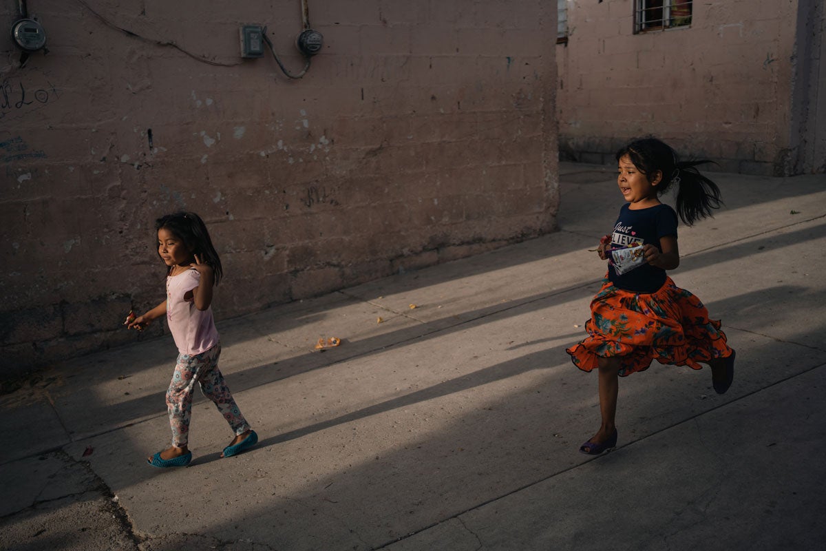 Children running on the road