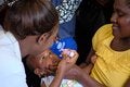 Child receives polio vaccine