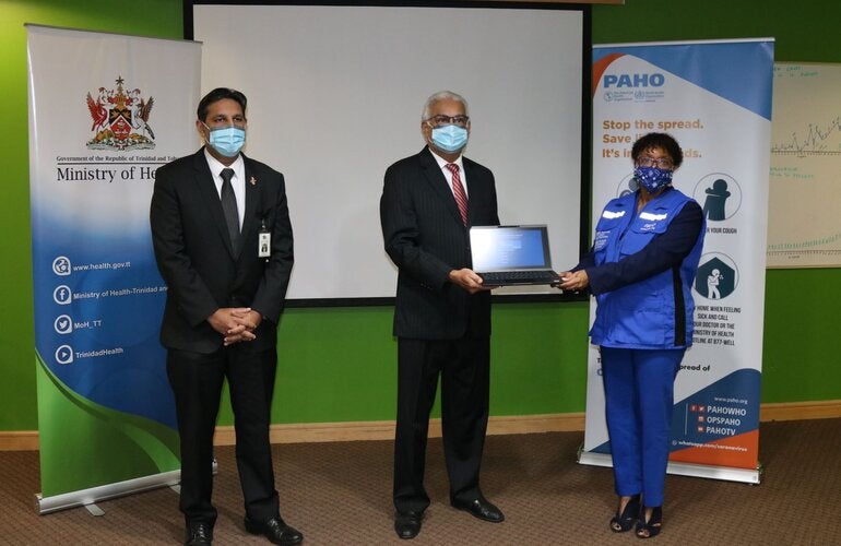 From L-R: Dr. Roshan Parasram, Chief Medical Officer; The Honorable Terrence Deyalsingh, Minister of Health; and Dr. Erica Wheeler, PAHO/WHO Representative