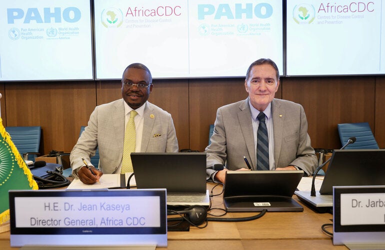 Dr. Jean Kaseya, Director General, Africa CDC and Dr. Jarbas Barbosa during the signing of agreement at PAHO HQ.