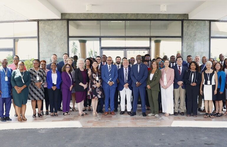 "Group photo of multisectoral stakeholders at a consultation hosted at the CARICOM Secretariat for the development of a new Caribean Subregional Cooperation Strategy"