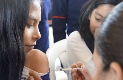 Adolescent girl received VPH vaccine to prevent cervical cancer in the future