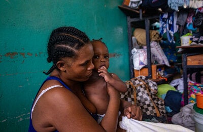 Displaced mother and child in shelter