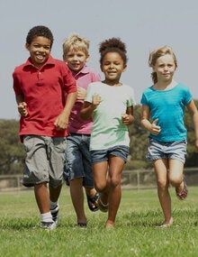 children running in a field