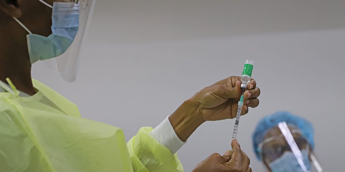 Nurse preparing a vaccine for use