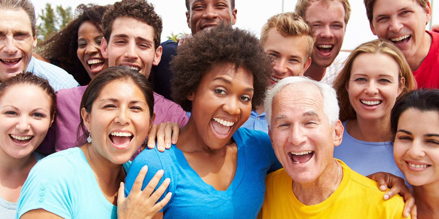 group of people smiling at the camera