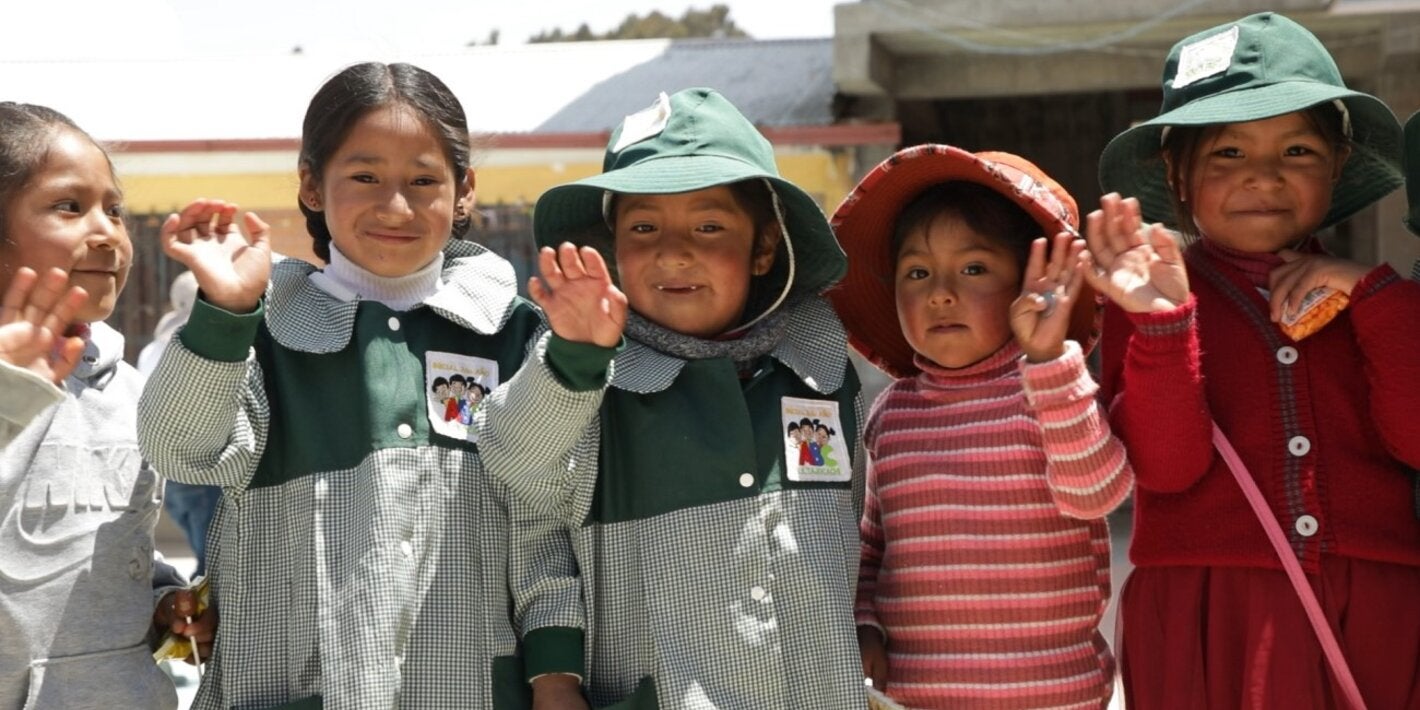 Children of the Americas posing in front of the camara