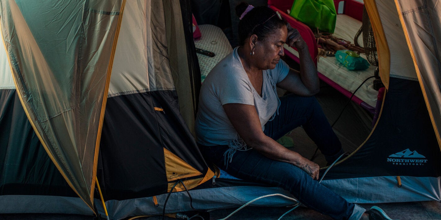 woman in tent after disaster