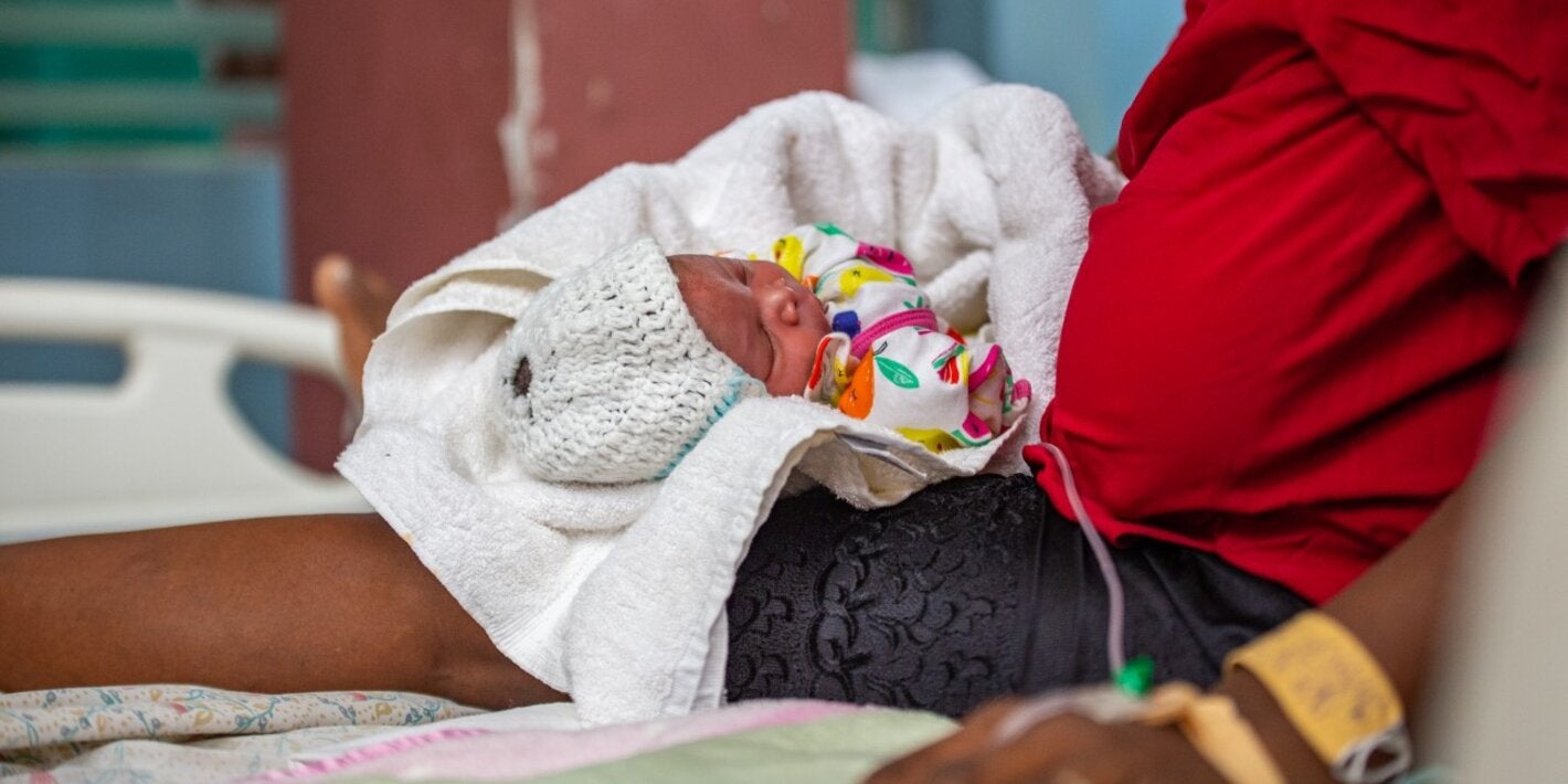 Newborn with his mother