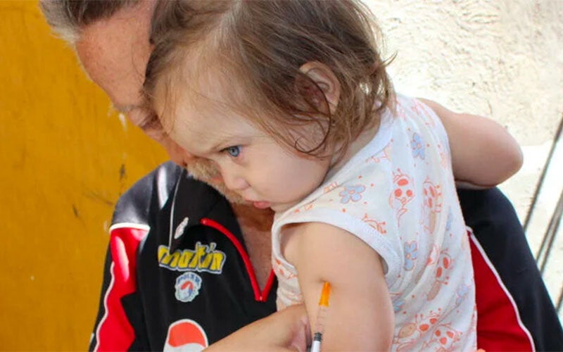 baby getting measles vaccine