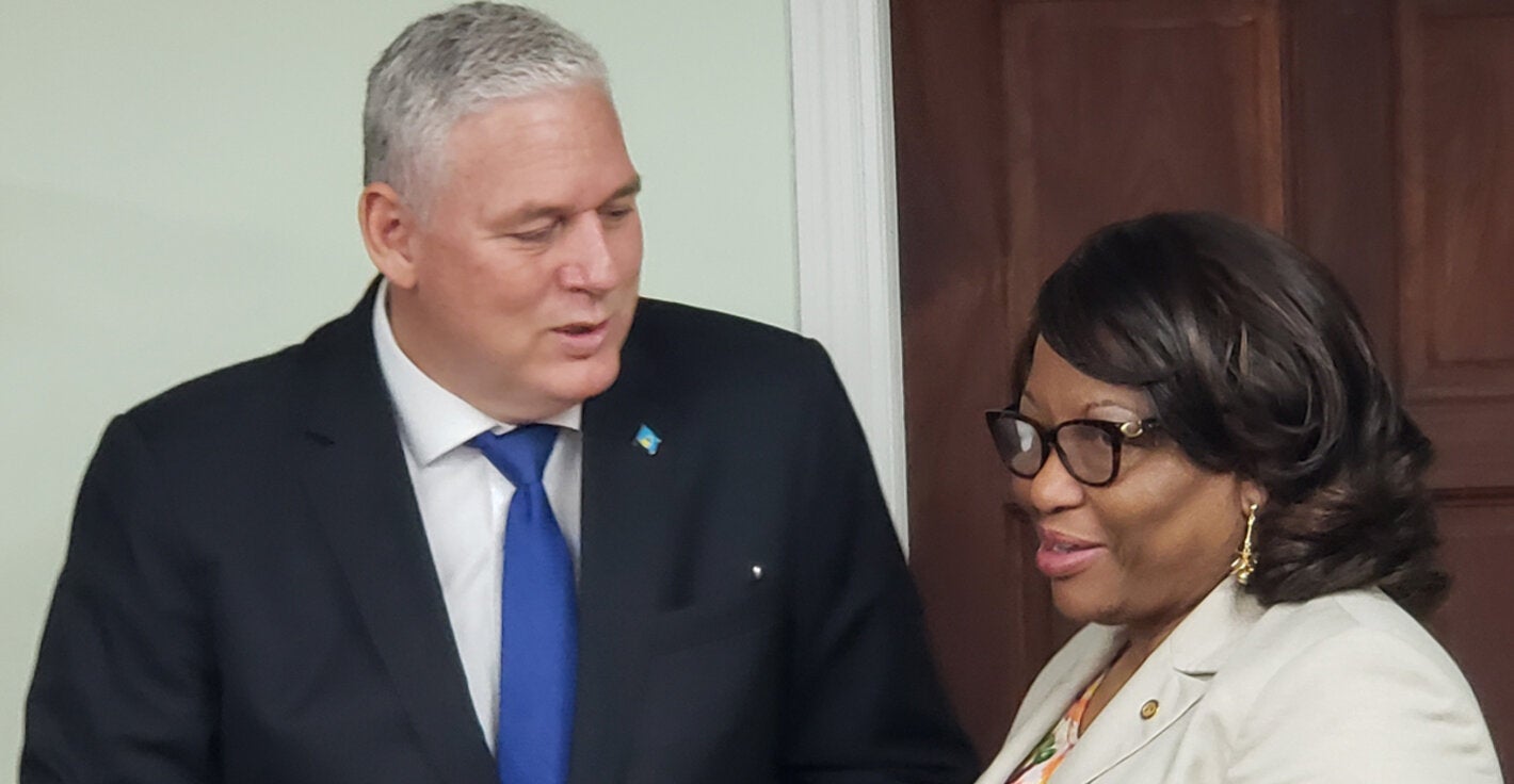 Prime Minister of St Lucia, Allen Chastanet with Dr. Carissa F. Etienne