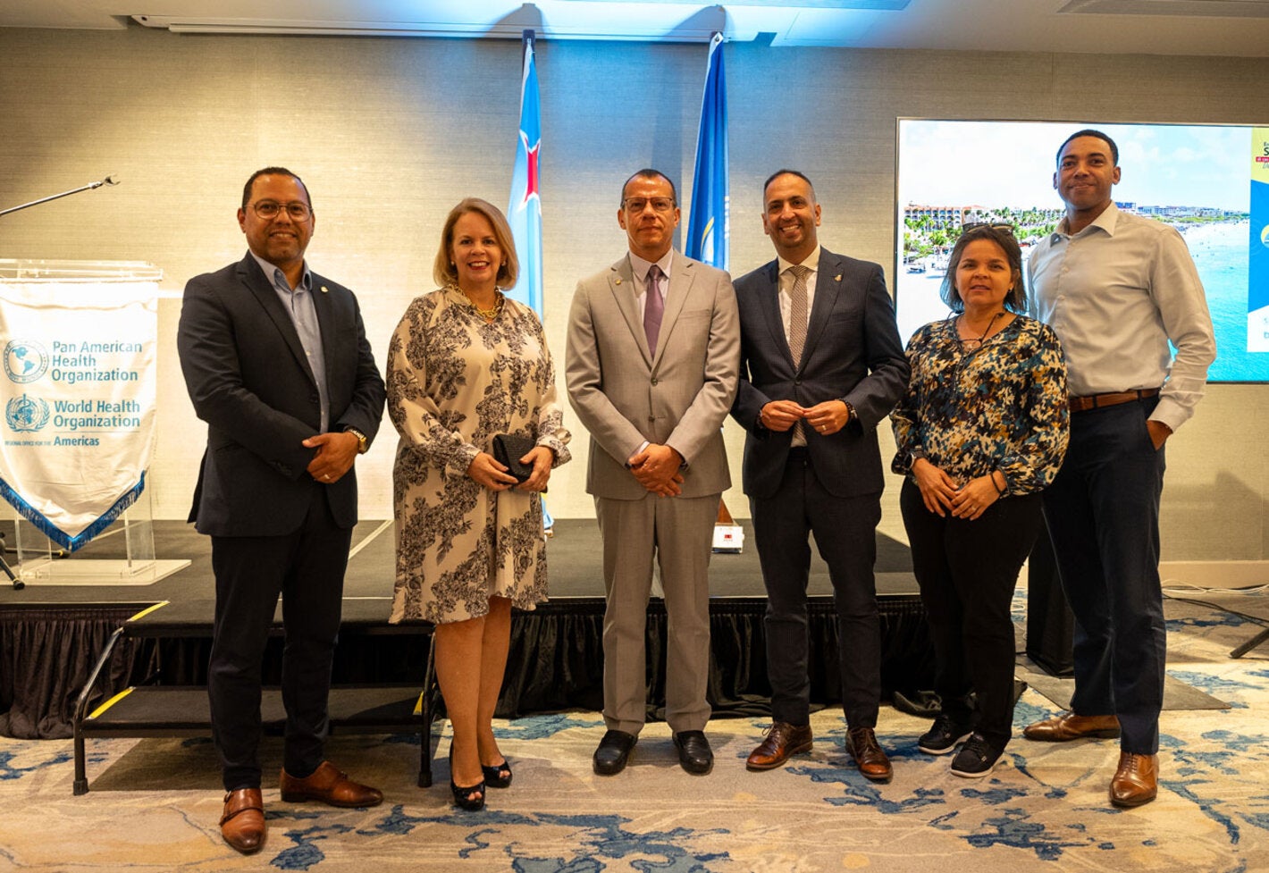 (at centre from L to R) Prime Minister of Aruba, Her Excellency Evelyn Wever-Croes, PAHO/WHO Representative for Trinidad and Tobago and the Dutch Caribbean Islands, Dr. Gabriel Vivas Francesconi and the Minister of Tourism and Health, Mr. Danguillaume P. Oduber.