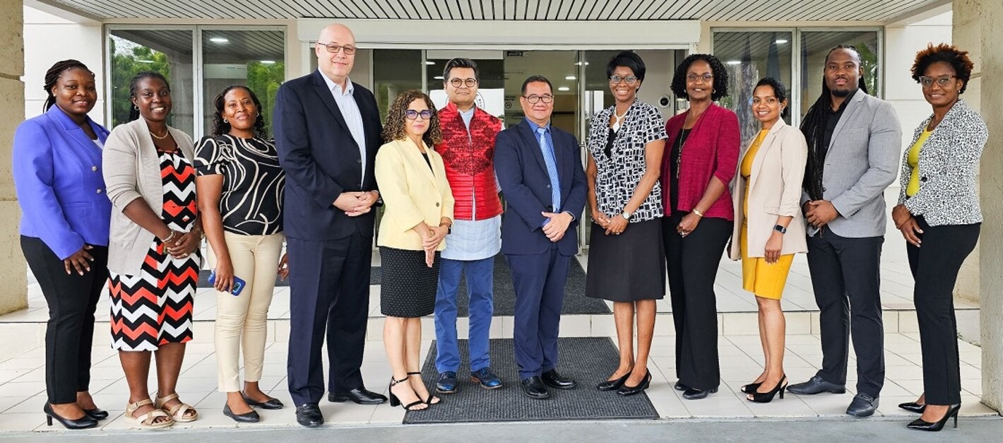 UWI Students, PAHO Heads of office and tutors at the PAHO Barbados Office