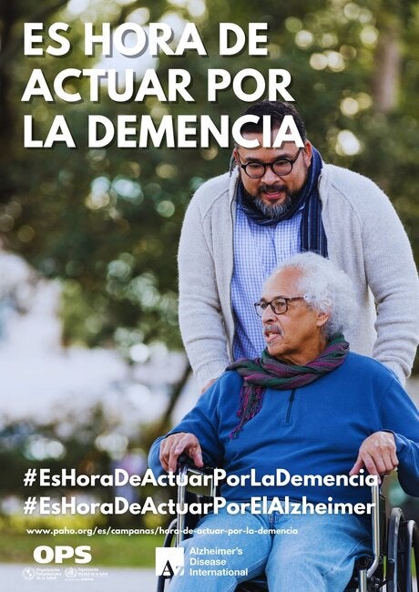 Afiche que muestra a un hombre empujando una silla de ruedas donde va un hombre mayor que él