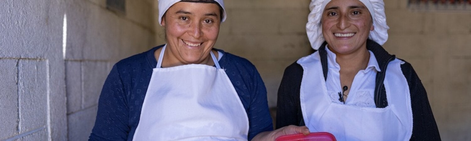 Two female workers with protection